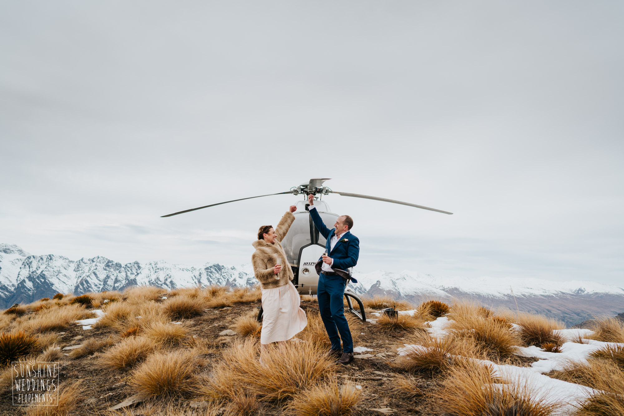 Wedding in front of helicopter on Cecil Peak Queenstown